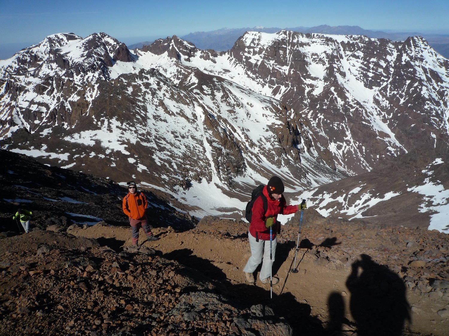 Guided trek from Imlil to Toubkal Refuge, with mule paths, High Atlas mountain trails and Berber village landscapes.
