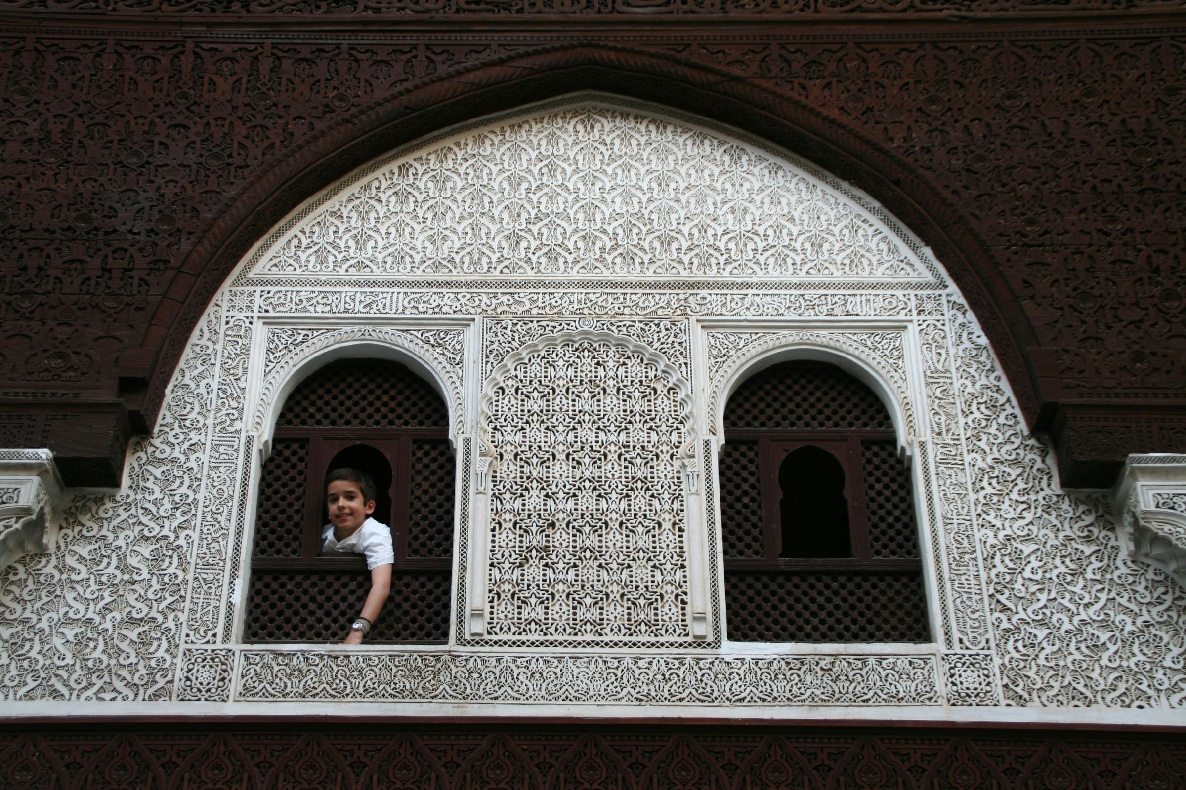 Guided visit of Marrakech medina, Bahia Palace, Ben Youssef Madrasa and traditional souks during an imperial cities tour in Morocco.