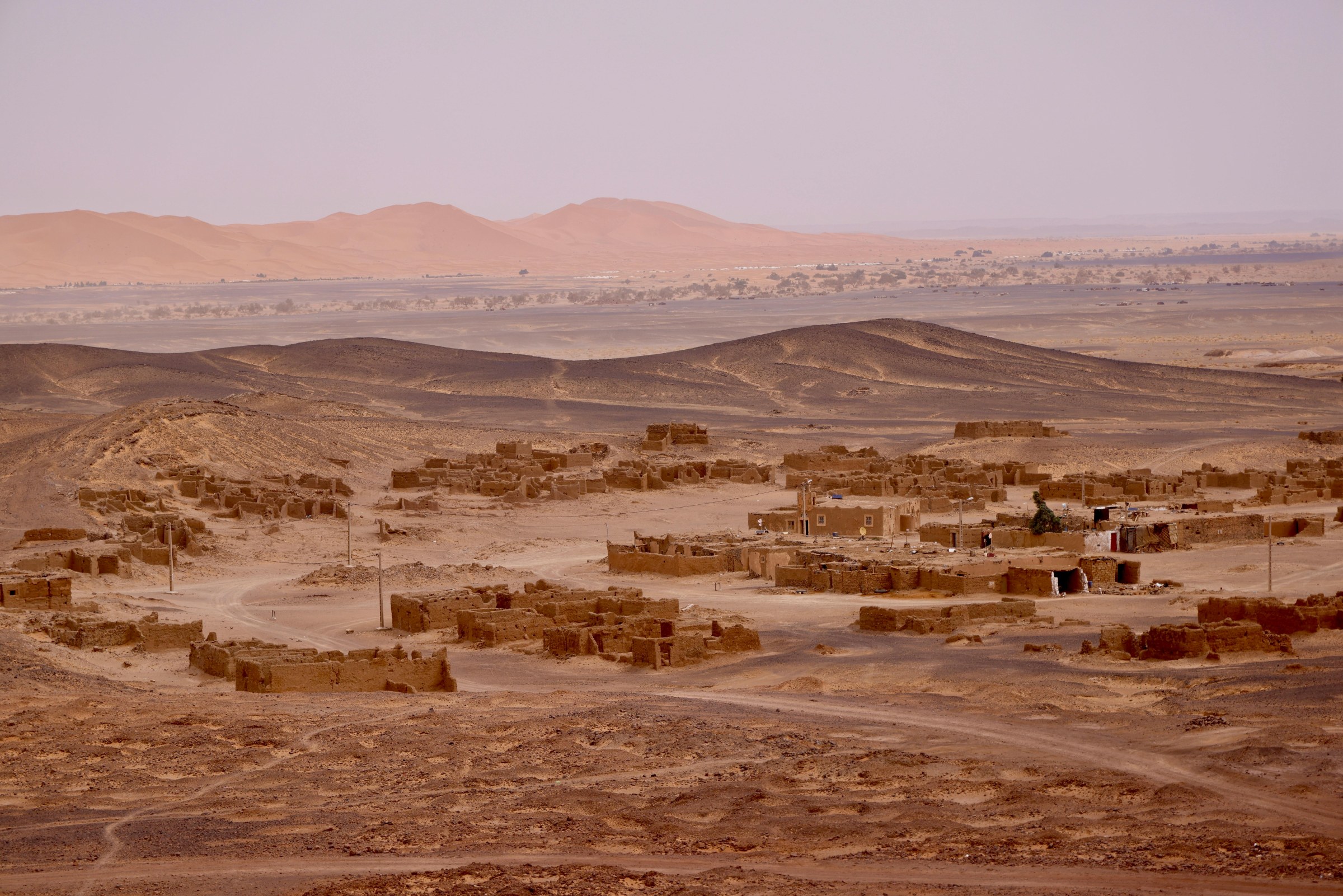 Journey from Ouarzazate to Merzouga, ending with Erg Chebbi dunes, Sahara sunset and private desert camp experience.