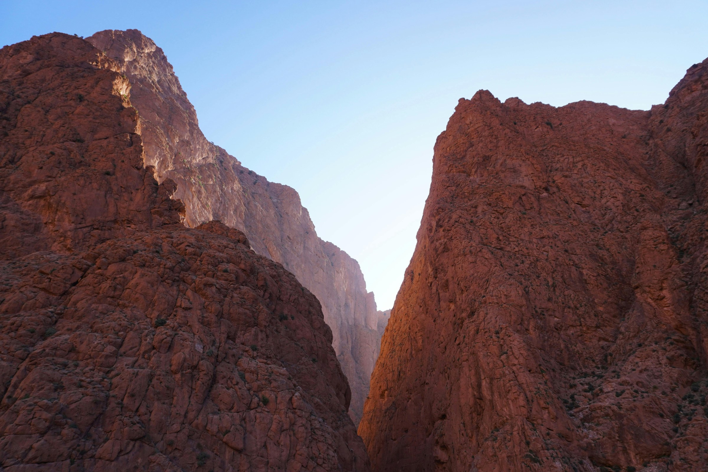 Dadès Gorges and winding scenic road in southern Morocco, with red rock formations and High Atlas foothills