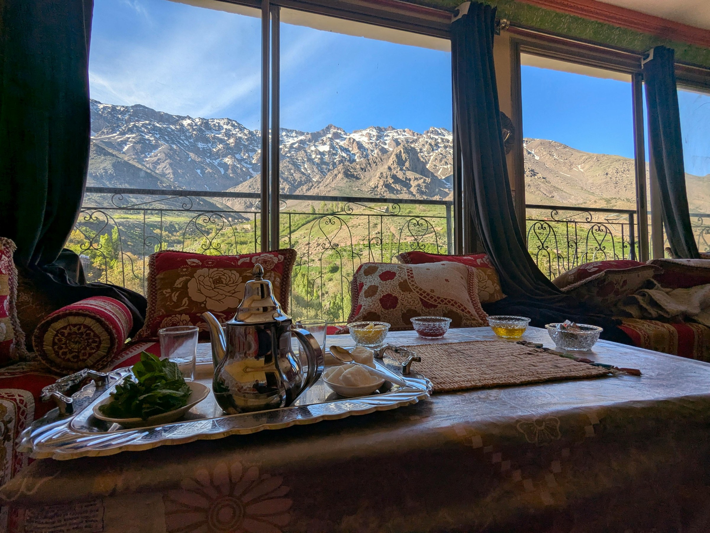 Scenic road from Ouarzazate to Marrakech through the High Atlas Mountains on a private Morocco travel route.