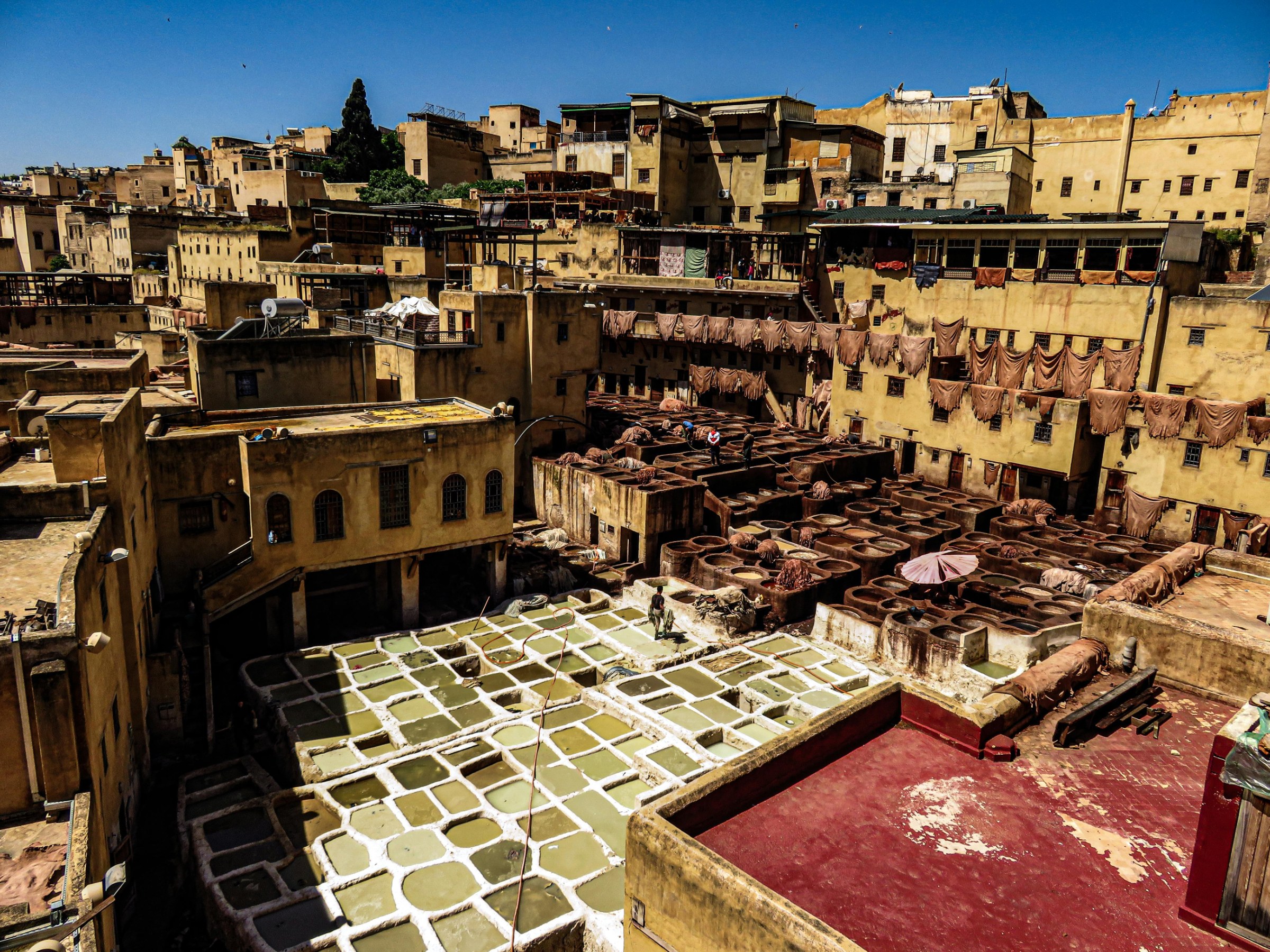 Private guided visit of Fes medina, artisan workshops, tanneries, madrasas and traditional Moroccan craftsmanship.