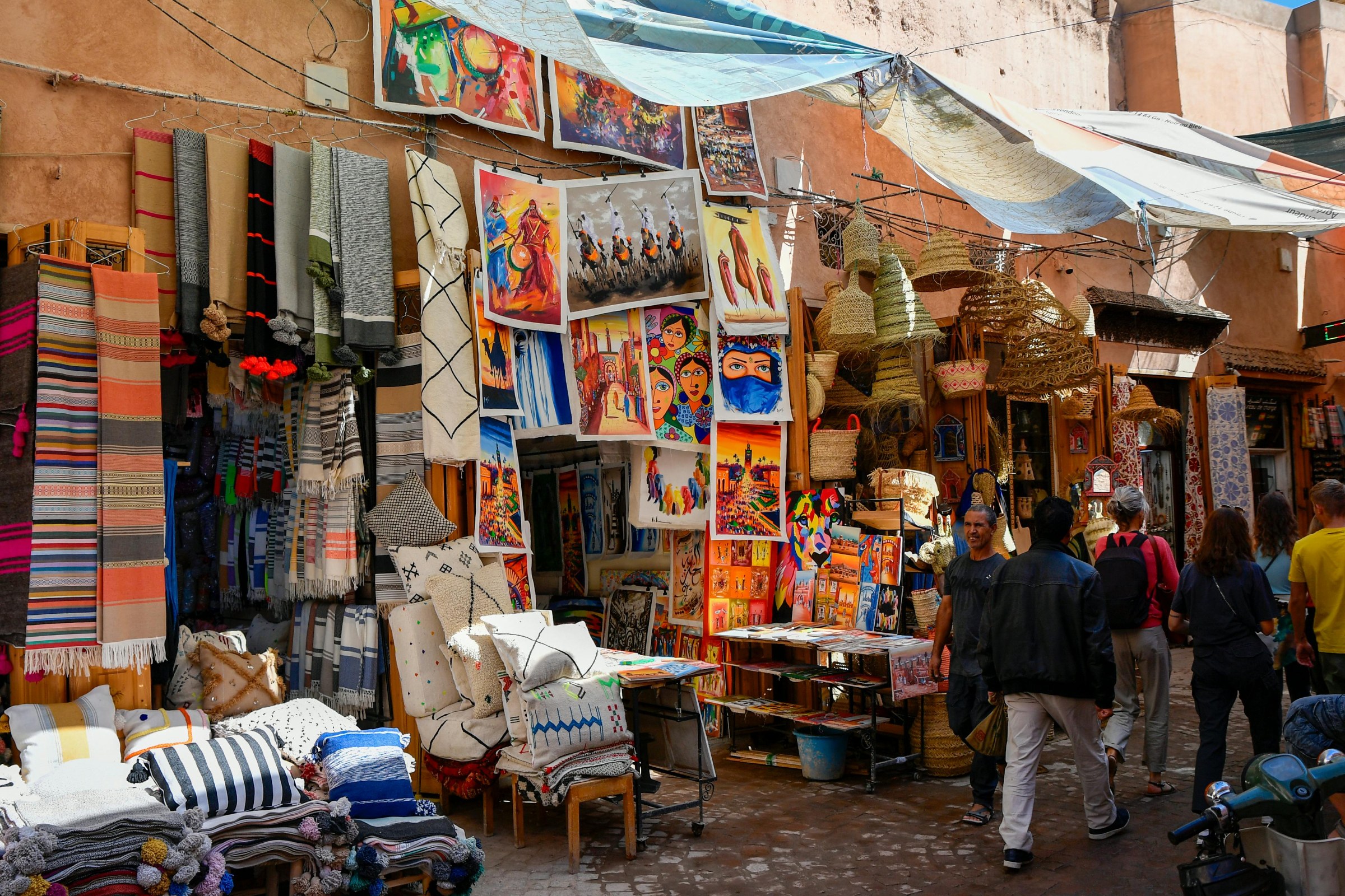 Guided visit of Marrakech medina, souks and historic monuments before a private southern Morocco kasbah itinerary.