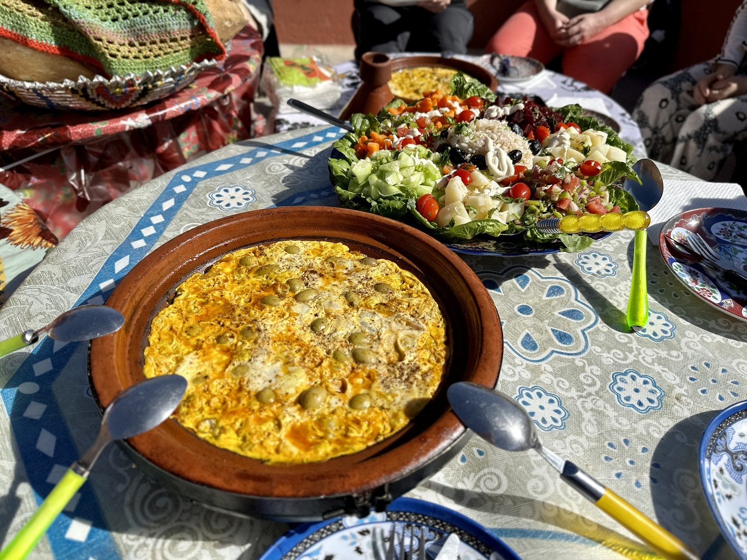 Return from Imlil to Marrakech after a guided Mount Toubkal trek, with High Atlas landscapes and medina relaxation.