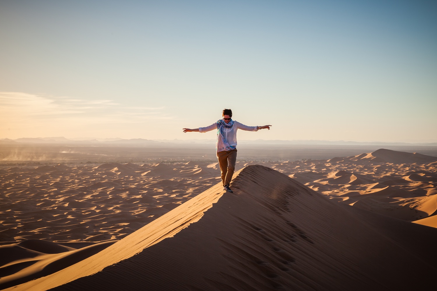 Guided dune walk in Merzouga and Erg Chebbi, with Sahara landscapes, camel ride, desert camp and local experiences in Morocco.
