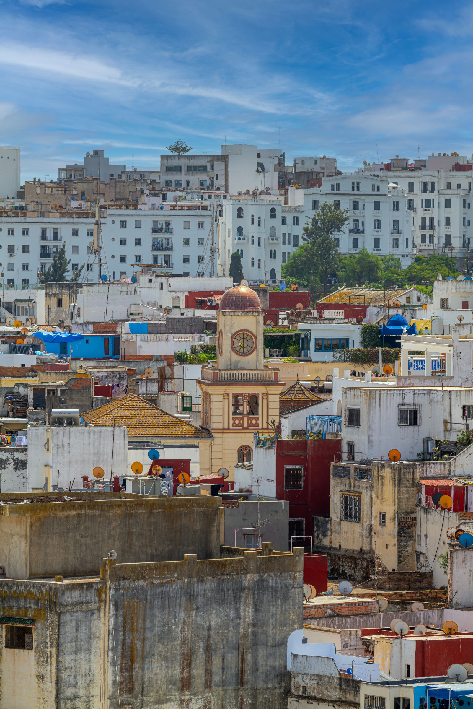 Rooftops and clock tower of a northern Moroccan medina